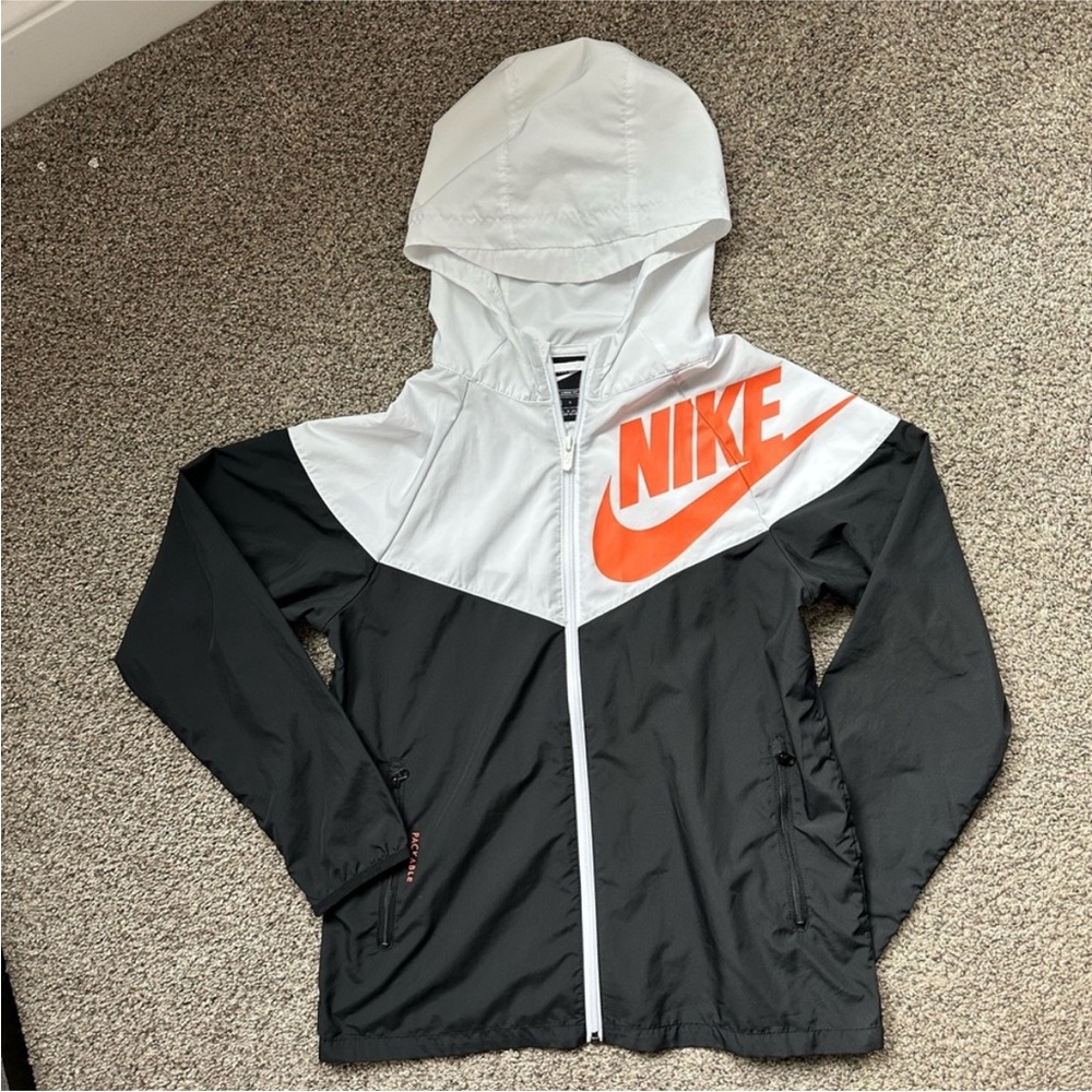 Nike Kids Raincoat in Black and White with Orange Logo